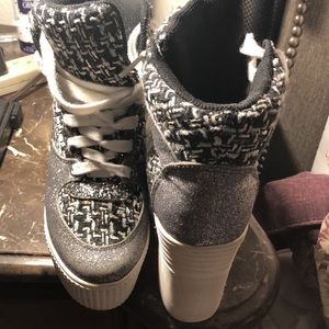 Hi heel tennis shoes size 7 silver black and white used in good condition